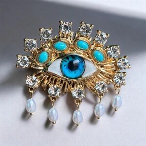 Schiaparelli Inspired Rose Gold and Blue Evil Eye Brooch